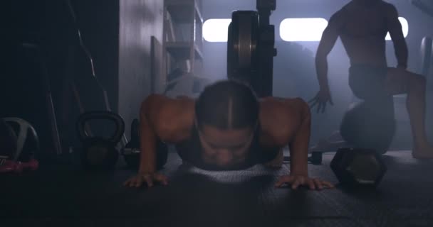 Woman In Sportswear Performing Gym Press Ups — Stock Video