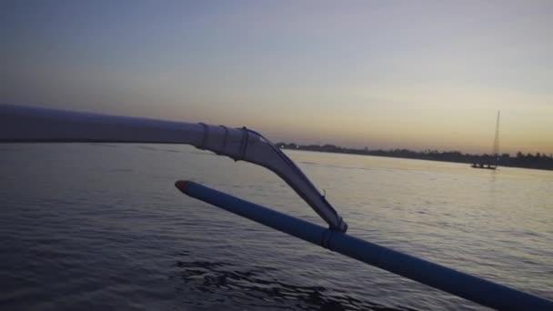 Outrigger Boat On Sea At Dusk In Bali — Stock video