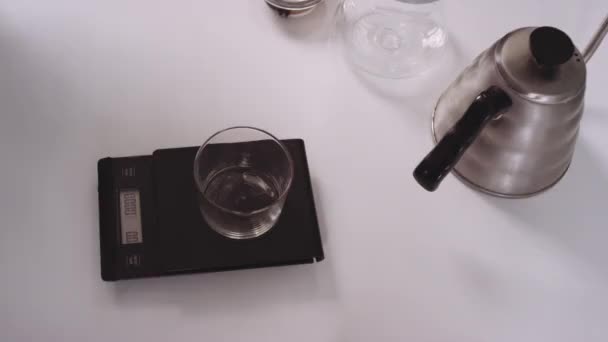 Spooning Coffee Into Bowl On Scales — Stockvideo