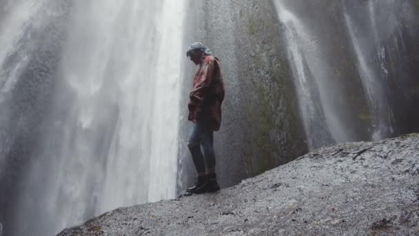 Young Woman On Rock Before Waterfall — Stock Video