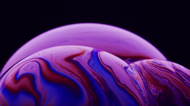 Vacker abstrakt makro skott av rosa och blå färger på ytan: — Stockvideo