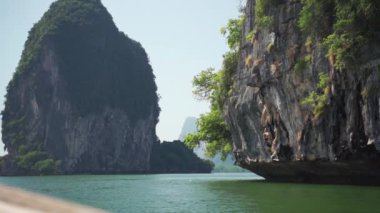 Serene shot of Ocean, Mountainside Clifs, Trees, and Sky - Khao Lak, Tayland