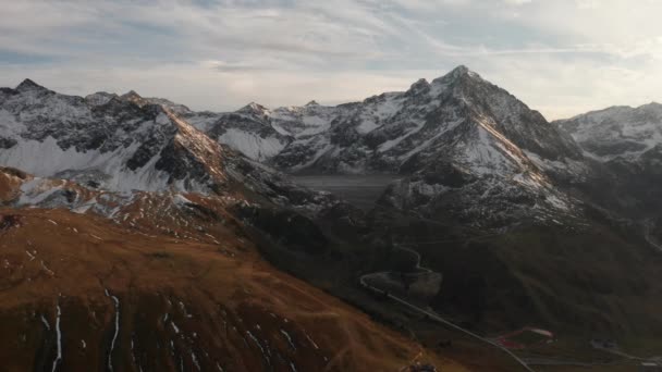 Panoramic Wallpaper View of Mountainous Snowy Peaks and a Narrow Road — Stock Video