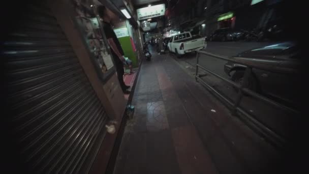 POV Shot of Person Running Away in the Street's Sidewalk at Night — Stockvideo