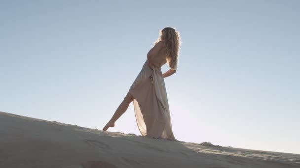 Graceful And Beautiful Woman Dancing On Sunny Sand — Stock Video