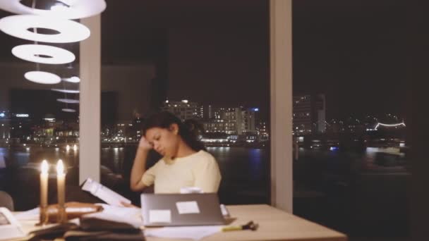 Dedicated Student Reading Textbooks At Night — Video Stock