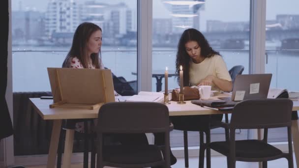 University Students Studying At Table — Stockvideo