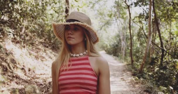 Amazed and Joyous Young Blonde Traveler Strolling on a Cambodian Forest — Stok Video