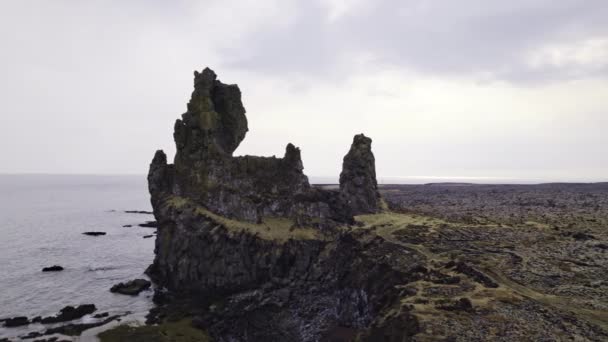 Stone Structures Surrounded by Sea Waters and Birds Flying Over, Iceland — ストック動画