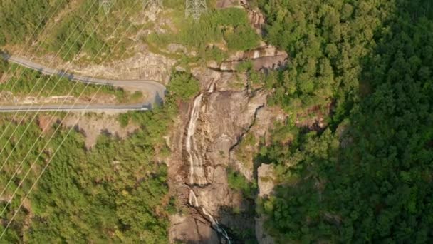 Drone Over Road And Rocky Waterfall In Forest — Stock Video