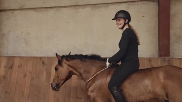 Woman Riding Bareback On Horse Walking Around Paddock — Stock Video