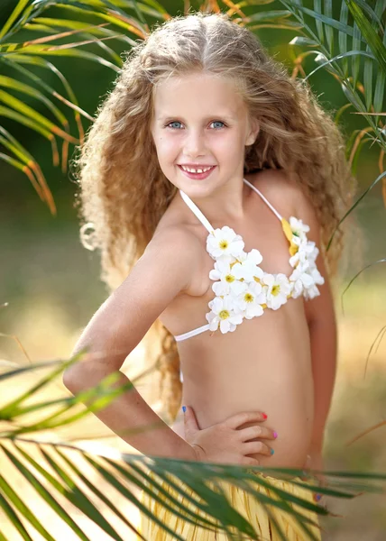 Portrait of little girl in tropical style — Stock Photo, Image