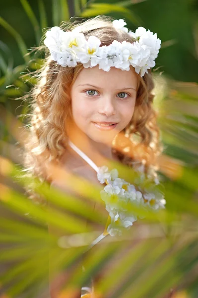 Portrait of little girl in tropical style — Stock Photo, Image