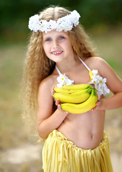 Portrait of little girl in tropical style — Stock Photo, Image