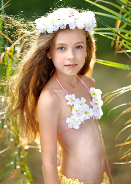 Portrait of little girl in tropical style — Stock Photo, Image