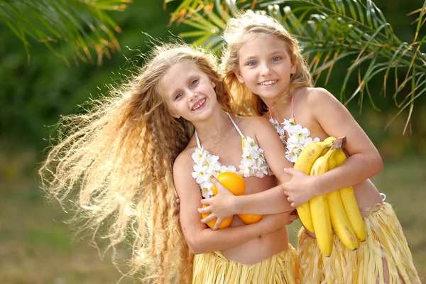 Portrait of two girl in tropical style — Stock Photo, Image