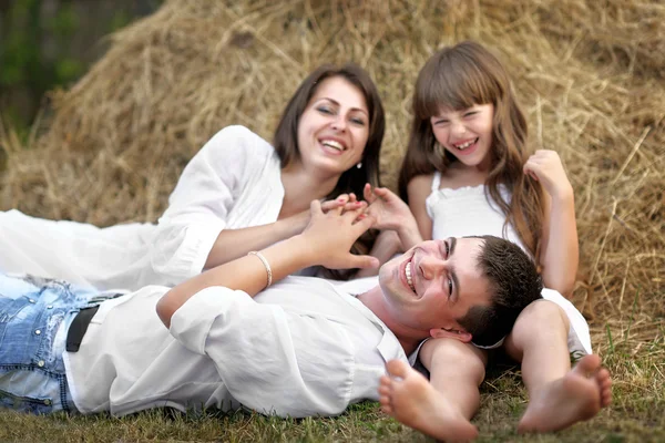 Portrait of a happy family in summer nature — Stock Photo, Image