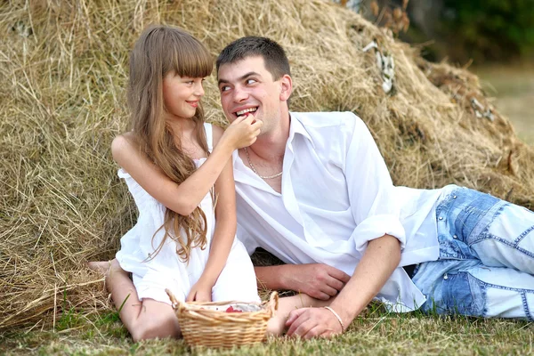 Portrait of a happy family in summer nature — Stock Photo, Image