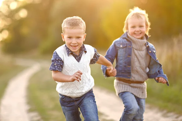 Portrait of a boy girl in a summer — Stock Photo, Image