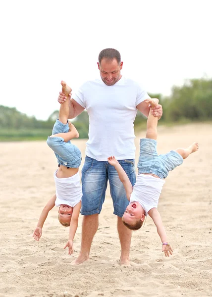 Portrait of a happy family in summer nature — Stock Photo, Image