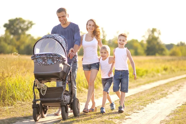 Portrait of happy family relaxing in nature summer — Stock Photo, Image