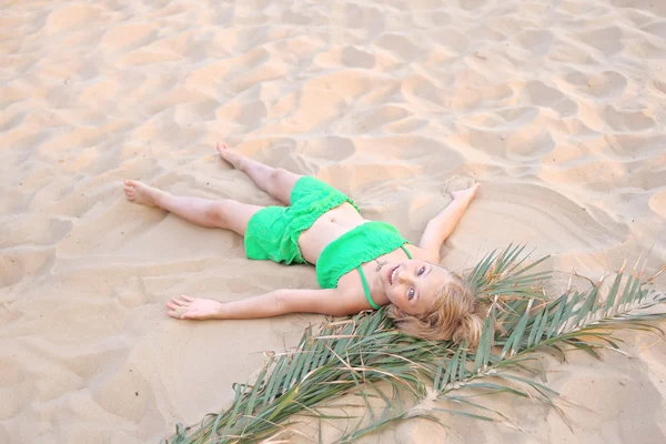 Portrait of little girl in tropical style — Stock Photo, Image