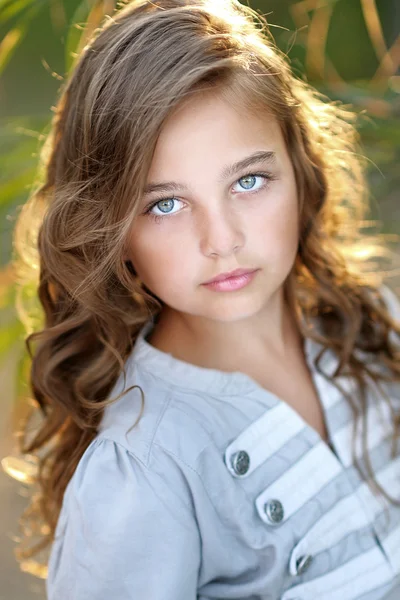 Portrait of little girl in tropical style — Stock Photo, Image