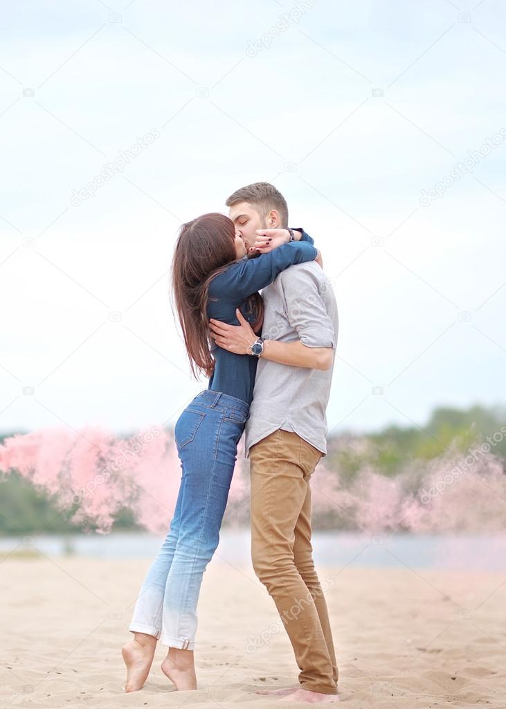 beautiful Couple in love on summer beach