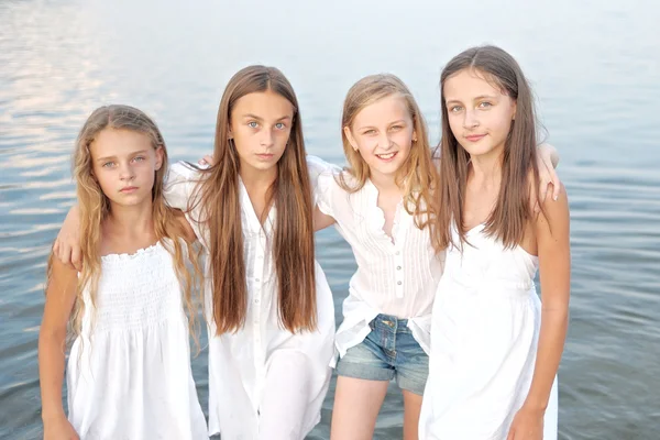 Portrait of children on the beach in summer — Stock Photo, Image