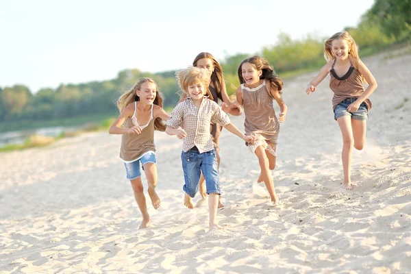 Portrait of children on the beach in summer Stock Picture