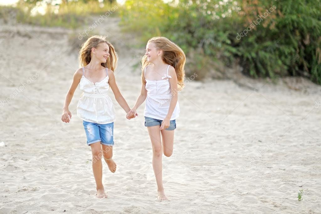 Two Girls Playing With Each Other