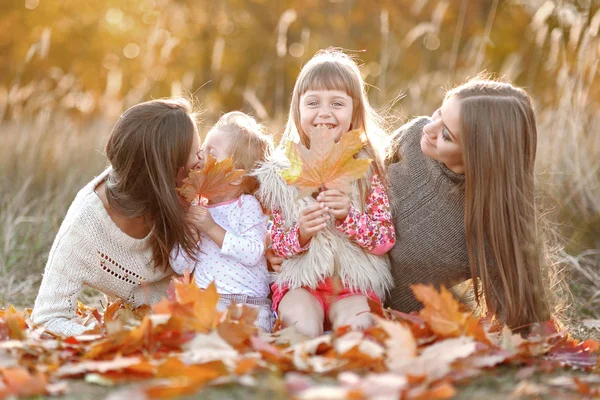 Portrait of a beautiful family in autumn — Stock Photo, Image