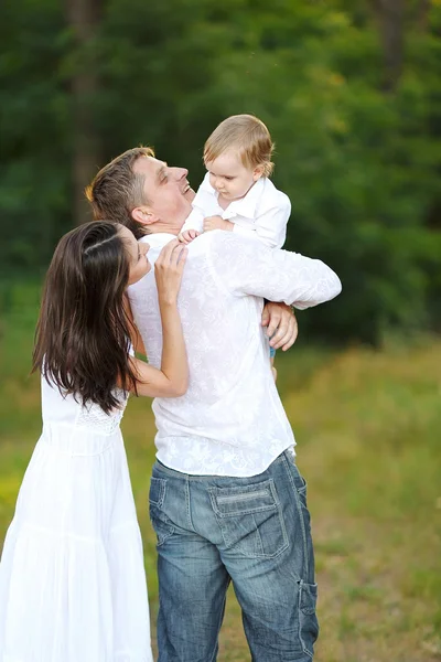 Portrait of a happy family in summer nature — Stock Photo, Image