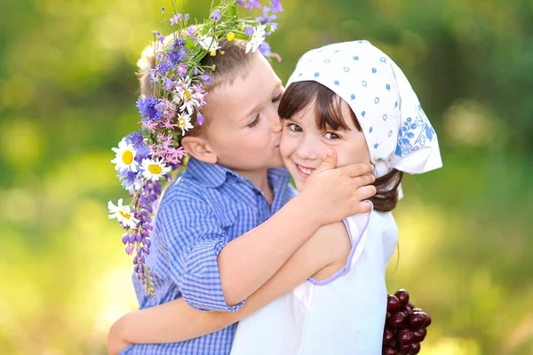 Portrait of a boy and girl  in summer — Stock Photo, Image