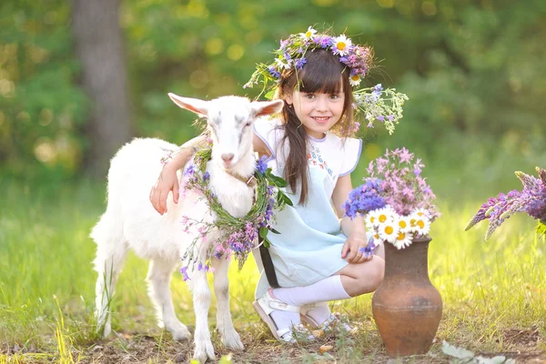 Portrait of a beautiful little girl in summer Stock Picture