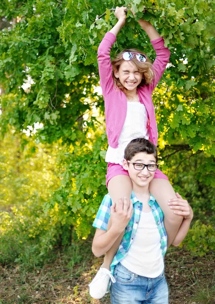 Portrait of a boy and girl  in summer — Stock Photo, Image