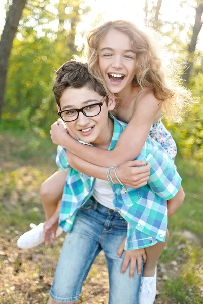 Portrait of a boy and girl  in summer — Stock Photo, Image