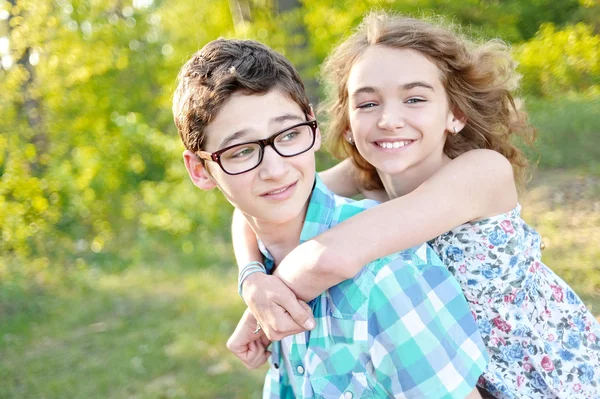 Portrait of a boy and girl  in summer — Stock Photo, Image