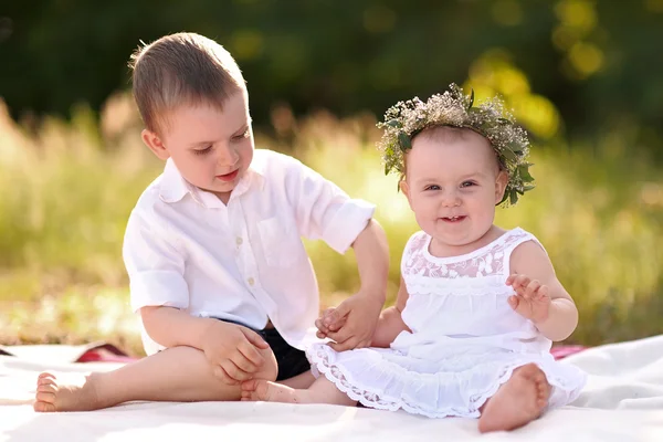 Portrait of a boy and girl  in summer — Stock Photo, Image