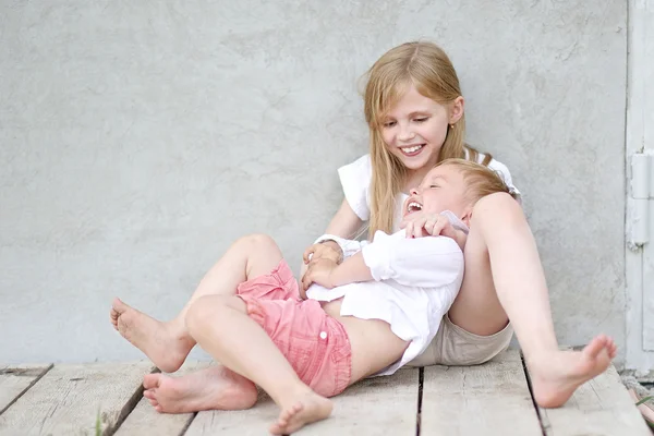 Portrait of a boy and girl  in summer — Stock Photo, Image