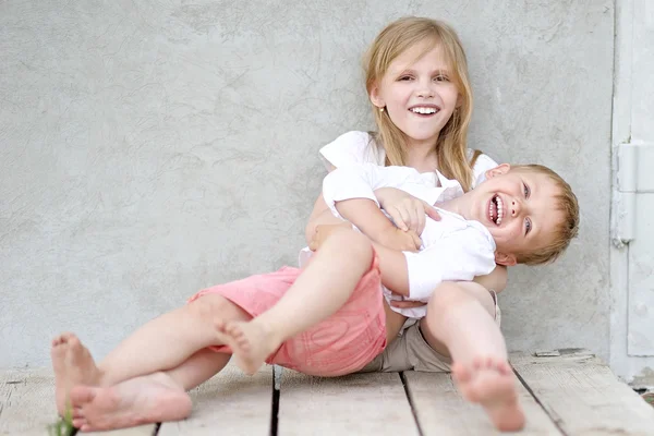 Portrait of a boy and girl  in summer — Stock Photo, Image