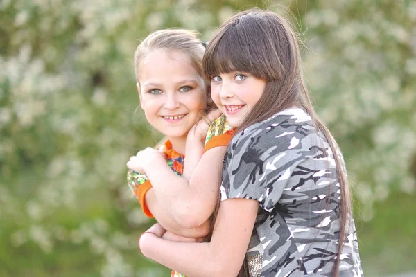 Portrait of two girls of girlfriends on a summer nature — Stock Photo, Image