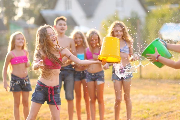 Portrait of happy children on nature in summer — Stock Photo, Image