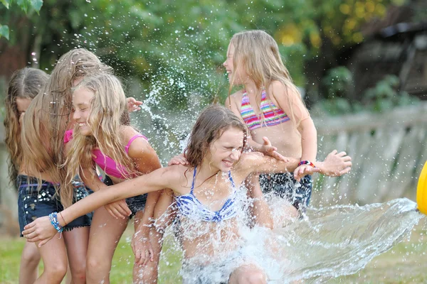 Portrait of happy children on nature in summer — Stock Photo, Image