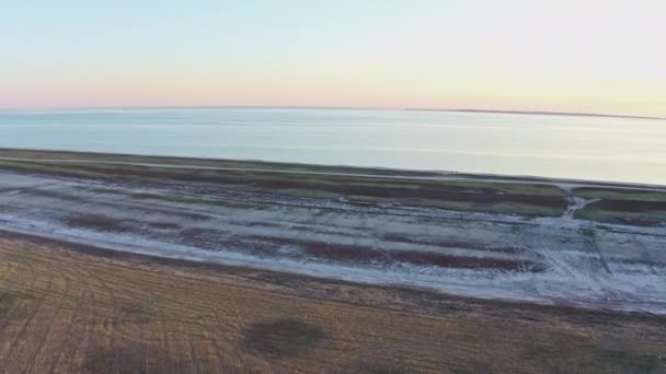 Colorful sunset and overgrown shore of Lake Sivash — Stock Video