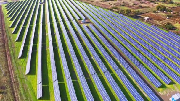 Fly over a renewable solar power plant with sun in Ukraine — Stock Video