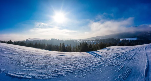 Magical winter panorama of beautiful snowy slopes — Stock Photo, Image