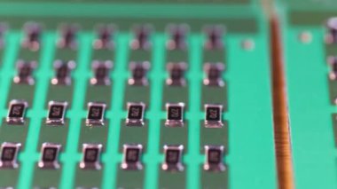 Slider pan shot of a a panel of SMD resistors