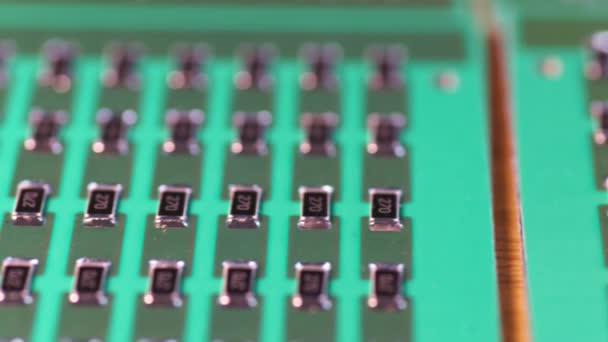 Slider pan shot of a a panel of SMD resistors — Video