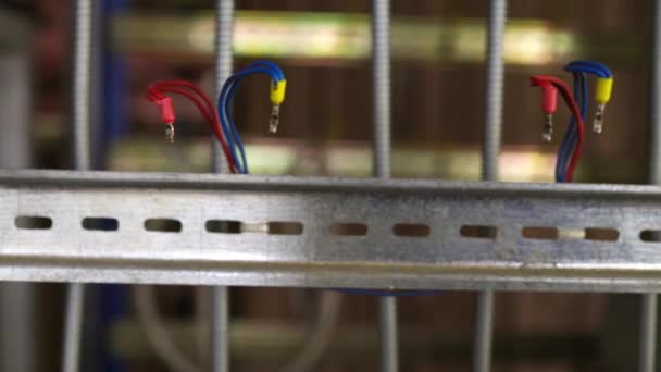 Slider shot of a blank metal DIN rails in workshop laboratory — Stock Video